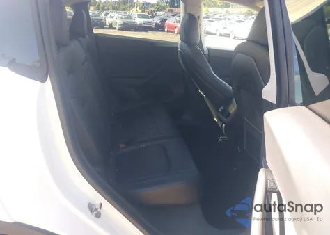 2021 Tesla Model Y Long Range Dual Motor All-Wheel Drive z USA, uszkodzony, nr VIN 5YJYGDEE3MF125592